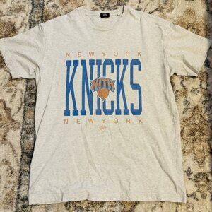 Kith’s New York Knicks Logo T Grey shirt retro grey